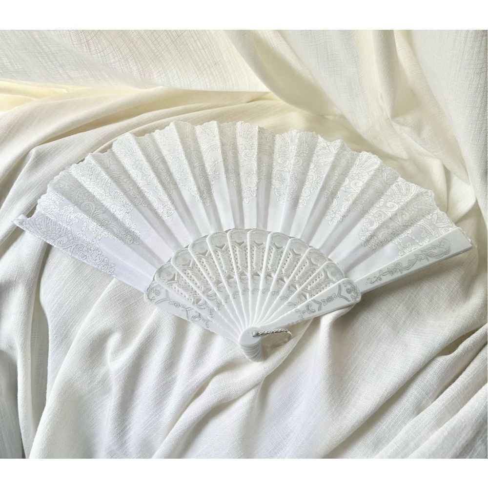 White hand fan with sparkle detailing ￼